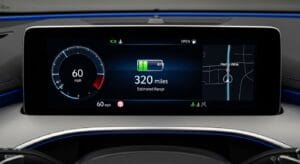 Electric vehicle dashboard displaying battery status and driving range